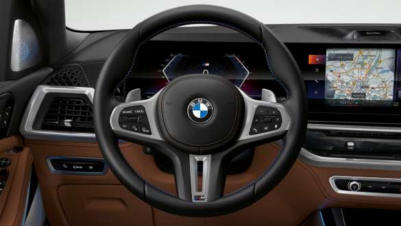 BMW X5 M60i xDrive G05 MP М кожен волан BMW X5 M60i xDrive G05 MP M кожен волан снимка отблизо