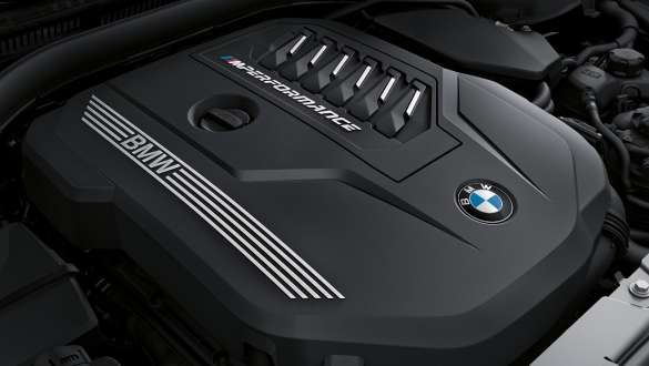 BMW М TwinPower Turbo бензинов двигател BMW M440i xDrive Купе G22 2020 BMW M440i xDrive Купе G22 2020 BMW М TwinPower Turbo редови 6-цилиндров бензинов двигател снимка отблизо