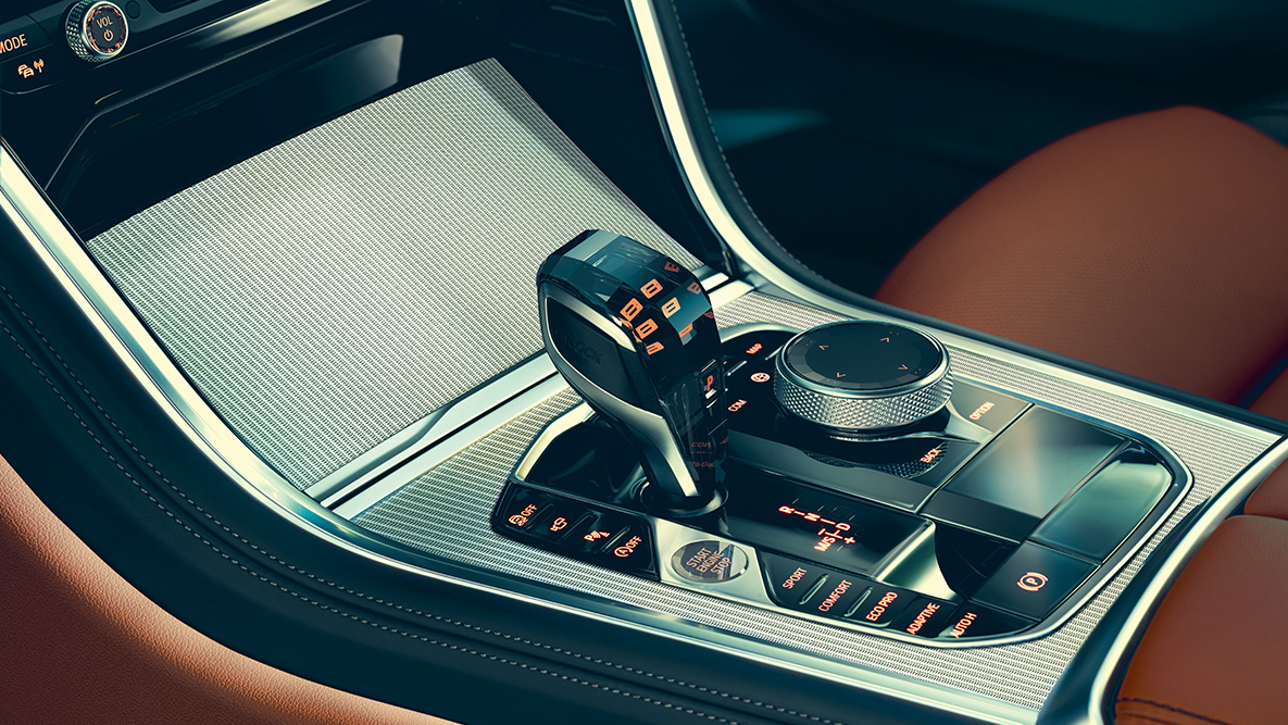 BMW Серия 8 Купе, кристални апликации. Снимка отблизо на кристалните апликации в интериора на BMW Серия 8 Купе.
