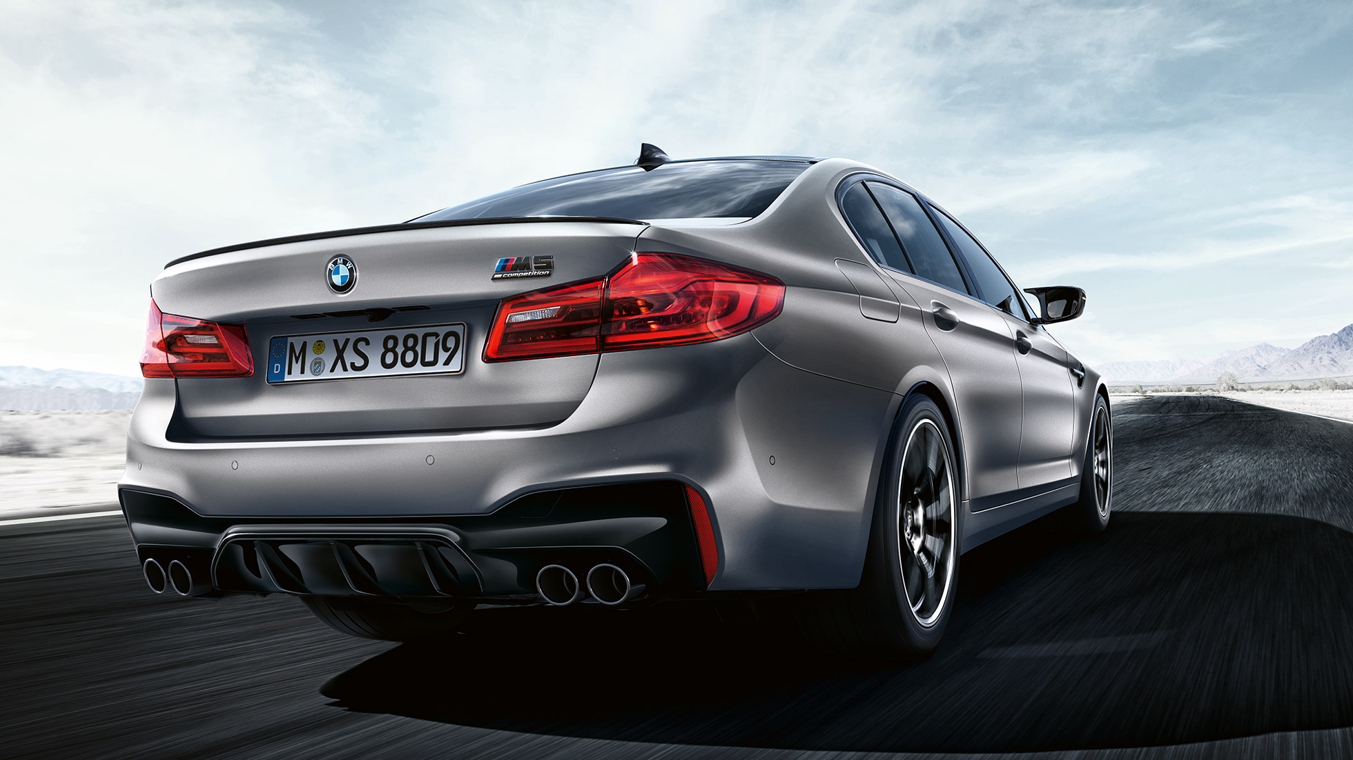 LED задни светлини. BMW M5 Competition, дизайн, три четвърти изглед отзад