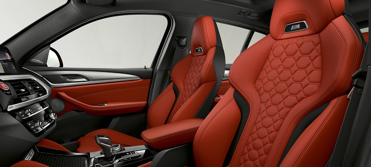 BMW X4 M, спортни седалки с кожена тапицерия 'Merino' Sakhir Orange. BMW X4 M, интериор, спортни седалки с кожена тапицерия 'Merino' Sakhir Orange.