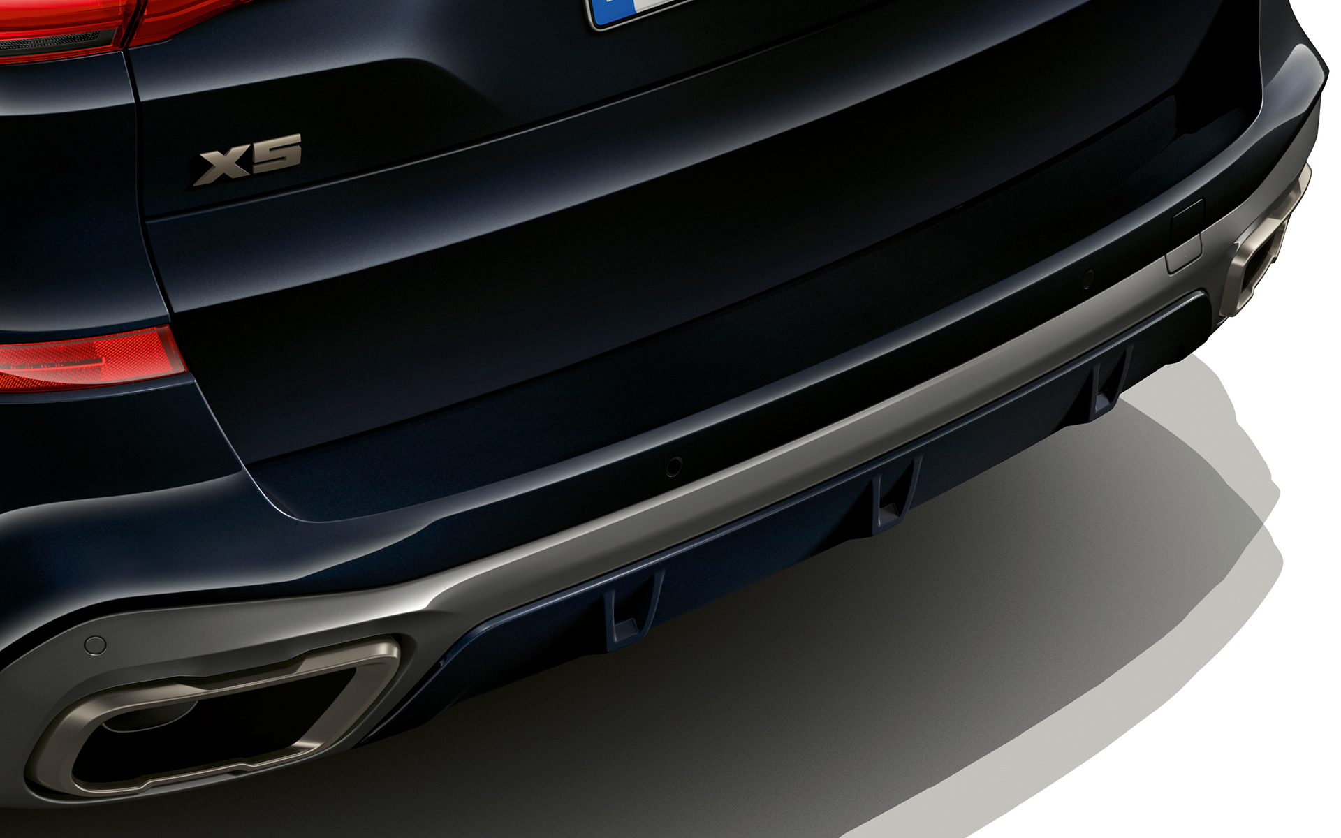 Изпускателната система на BMW X5 M50d М спортната изпускателна система и дифузорът на BMW X5 M50d